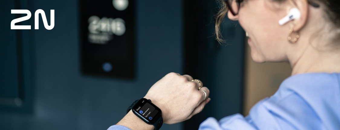 image of woman with apple watch unlocking their door