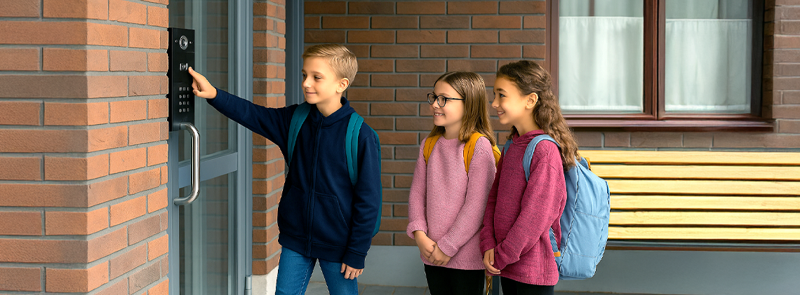 Access control imrpoves safety in schools - image of teacher with kids in school