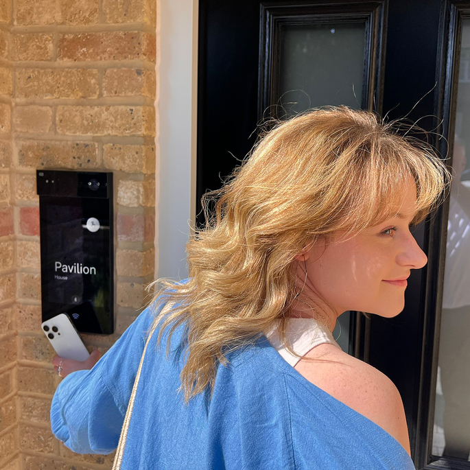 Resident using smartphone credentials at the Pavilion House 2N IP Style intercom