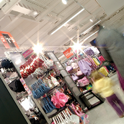 ASDA Basildon flagship store clothing department and metal plank ceiling