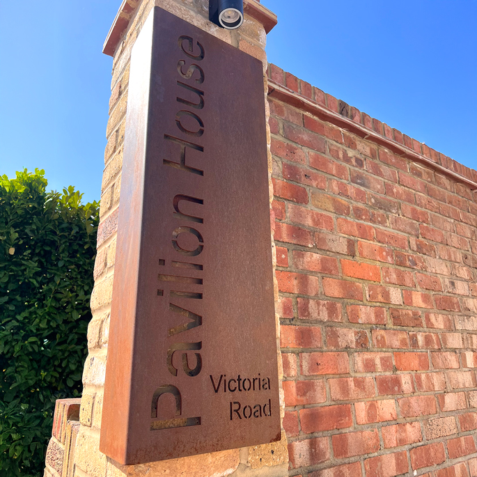 Pavilion House main gate sign on Victoria Road