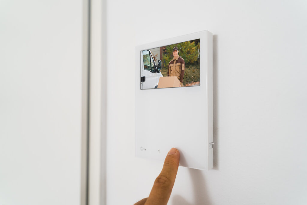 Integrated video door entry screen showing a delivery driver