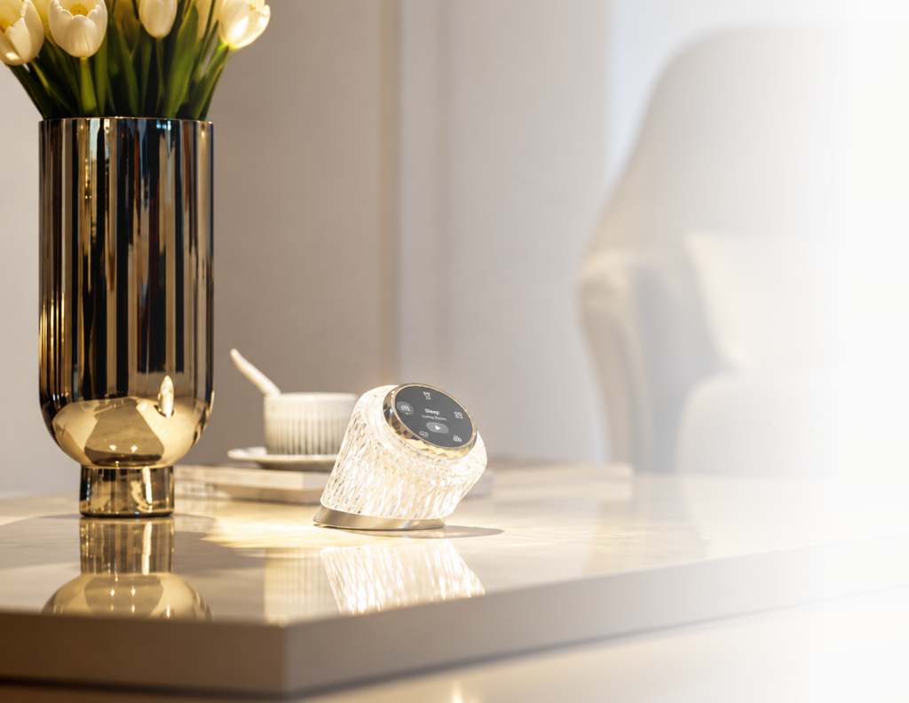 Akubela smart home control device with illuminated design displayed on a modern living room table