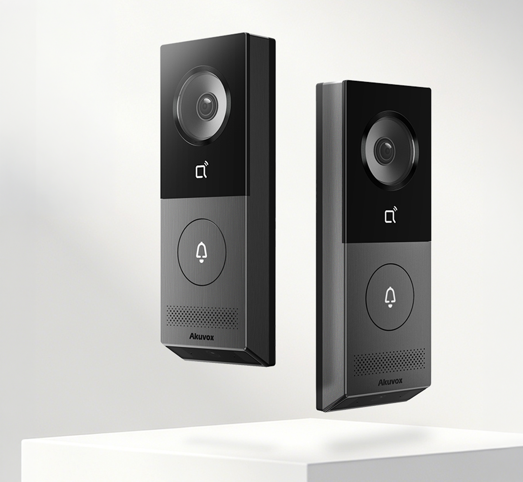 Two Akuvox video door intercoms with built-in cameras, contactless access readers and call buttons.